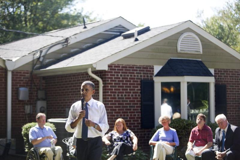 U.S. President Barack Obama holds a backyard discussion at the home of John and Nicole Armstrong to discuss with their neighbors Recovery Act investments on September 13, 2010 in Fairfax, Virginia.
